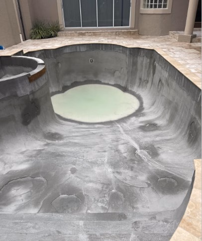 Worn, dated pool before renovation